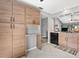 Kitchen showcases wooden cabinets, granite countertops, and stainless steel appliances at 4505 Kingsmere # 2, Sarasota, FL 34235