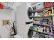 Functional laundry room with washer and dryer, shelving, and storage space at 4505 Kingsmere # 2, Sarasota, FL 34235