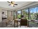 Inviting living room with comfortable seating, large windows, and backyard views at 4505 Kingsmere # 2, Sarasota, FL 34235