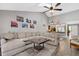 Spacious living room with luxury vinyl floors, vaulted ceilings, and an open floor plan at 4505 Kingsmere # 2, Sarasota, FL 34235