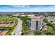 Incredible aerial view featuring luxury tower, manicured landscaping and scenic surroundings at 501 Haben Blvd # 506, Palmetto, FL 34221
