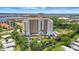 Aerial view showcasing the condo's prime location near the intercoastal waterway and beach at 501 Haben Blvd # 506, Palmetto, FL 34221