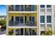 Building view showing private balconies with seating, perfect for enjoying the outdoor views at 501 Haben Blvd # 506, Palmetto, FL 34221
