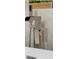 Close-up of a modern soaking tub faucet with plants in the decorative wall niche at 501 Haben Blvd # 506, Palmetto, FL 34221