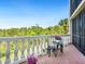 Private balcony features beautiful landscaping and furniture, perfect for enjoying the outdoors at 5420 Eagles Point Cir # 106, Sarasota, FL 34231