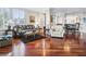 Bright living room with hardwood floors and traditional furniture and decor at 5420 Eagles Point Cir # 106, Sarasota, FL 34231