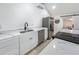 Clean kitchen featuring stainless steel appliances, a deep sink, and quartz countertops at 55 Braden Castle Dr, Bradenton, FL 34208