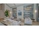 Relaxing lounge featuring plush sofas, decorative accents, and elegant finishes that create a welcoming ambiance at 5622 Arnie Loop, Lakewood Ranch, FL 34211
