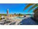 Community pool and spa area with ample seating and lush landscaping, perfect for relaxation at 5622 Arnie Loop, Lakewood Ranch, FL 34211