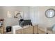 Functional home office offers natural light, neutral colors and ample space to work at 5622 Arnie Loop, Lakewood Ranch, FL 34211