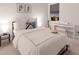 Bright bedroom with a cozy bed, musical instruments, and a window offering sunset views at 5718 Title Row Dr, Bradenton, FL 34210