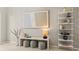 Beautifully staged foyer with modern console table, artwork, and decorative accents at 5718 Title Row Dr, Bradenton, FL 34210
