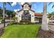 Attractive guard house entrance with lush landscaping at this gated community at 5718 Title Row Dr, Bradenton, FL 34210