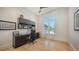 Well-lit home office featuring built-in storage and a large window with a neighborhood view at 612 Mourning Dove Dr, Sarasota, FL 34236