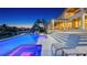 Stunning backyard with a pool, spa, and elegant patio furniture, perfect for relaxation at 612 Mourning Dove Dr, Sarasota, FL 34236