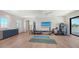 Workout room with views and space for yoga, cycling, and weight training at 612 Mourning Dove Dr, Sarasota, FL 34236
