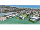 Aerial view of waterfront neighborhood with canals and beautiful houses at 630 De Narvaez Dr, Longboat Key, FL 34228