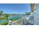 Enjoy breathtaking views of the bay from this home's private balcony, perfect for relaxation at 630 De Narvaez Dr, Longboat Key, FL 34228
