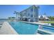 Backyard pool and spa on a gorgeous blue waterfront home at 630 De Narvaez Dr, Longboat Key, FL 34228