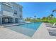 Exterior view of pool, surrounded by lounge chairs at 630 De Narvaez Dr, Longboat Key, FL 34228