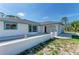 Beautiful one-story home featuring a charming entryway and well-manicured front yard at 645 Liberty St, Englewood, FL 34223