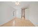 Neutral bedroom with light hardwood floors and a double window at 6552 Meandering Way, Lakewood Ranch, FL 34202