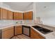 Close up on the kitchen with stone countertops and stainless steel appliances at 6552 Meandering Way, Lakewood Ranch, FL 34202