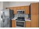 The kitchen area features stainless steel appliances and plenty of cabinet space at 6552 Meandering Way, Lakewood Ranch, FL 34202