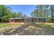 Spacious backyard features a screened-in pool and lush greenery at 6990 Richardson Rd, Sarasota, FL 34240