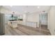 Spacious kitchen with stainless steel appliances and white cabinetry at 6990 Richardson Rd, Sarasota, FL 34240