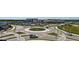 Overhead view of a roundabout near a shopping center, demonstrating convenient access to shops and local businesses at 6990 Richardson Rd, Sarasota, FL 34240