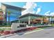 Exterior view of The Mall at University Town Center with landscaped entrance and modern architecture at 6990 Richardson Rd, Sarasota, FL 34240