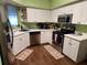 Modern kitchen featuring stainless steel appliances and white cabinetry at 7273 Cedar Hollow Cir # 102, Bradenton, FL 34203