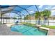 Sparkling pool featuring water features, lush landscaping, and a screened enclosure at 7379 47Th Avenue E Cir, Bradenton, FL 34203