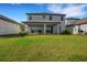 Spacious backyard featuring lush green grass at 7533 Nighthawk Drive, Sarasota, FL 34241