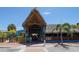 Unique building with straw roof that houses a bar and restaurant at 755 Edgemere Ln, Sarasota, FL 34242