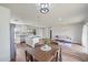 Open-concept living space featuring a modern kitchen and dining area at 7595 Berwick St, North Port, FL 34287