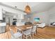 Dining area boasts wood floors and open access to the kitchen and the living room at 7716 Uliva Way, Sarasota, FL 34238