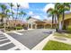 Gas station within the community featuring multiple pumps and well-maintained landscaping at 7716 Uliva Way, Sarasota, FL 34238