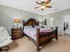 Nautical themed bedroom featuring a wooden bed frame, and custom decor at 8222 Haven Harbour Way, Bradenton, FL 34212