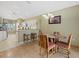 Cozy dining area adjacent to the kitchen, perfect for casual meals and entertaining at 8222 Haven Harbour Way, Bradenton, FL 34212