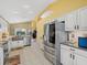 Spacious kitchen featuring stainless steel appliances and a copper sink at 8222 Haven Harbour Way, Bradenton, FL 34212