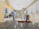 Bright kitchen boasts modern appliances, granite countertops, and a unique copper sink at 8222 Haven Harbour Way, Bradenton, FL 34212