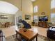 Bright and airy living room with vaulted ceilings and a comfortable seating arrangement at 8222 Haven Harbour Way, Bradenton, FL 34212