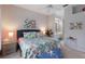 Comfortable bedroom featuring bright decor, a plush bed, and modern furnishings at 8706 52Nd E Dr, Bradenton, FL 34211