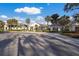 Exterior shot of the community clubhouse and well-maintained landscaping at 8706 52Nd E Dr, Bradenton, FL 34211