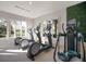 Cardio area featuring elliptical machines and large windows at 8706 52Nd E Dr, Bradenton, FL 34211
