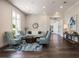 Interior lobby area featuring hardwood floors, comfortable seating, and decorative finishes at 8706 52Nd E Dr, Bradenton, FL 34211