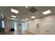 Community room with bright lighting, hardwood floors and access to ocean views at 8977 Midnight Pass Rd # 521, Sarasota, FL 34242