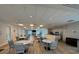 Large community center offering multiple tables, and a grand piano at 8977 Midnight Pass Rd # 521, Sarasota, FL 34242